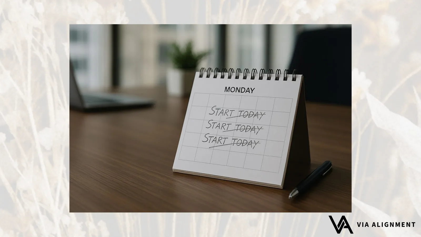 A desk calendar page reading "MONDAY" with "Start today" handwritten and crossed out three times, a pen resting beside it.